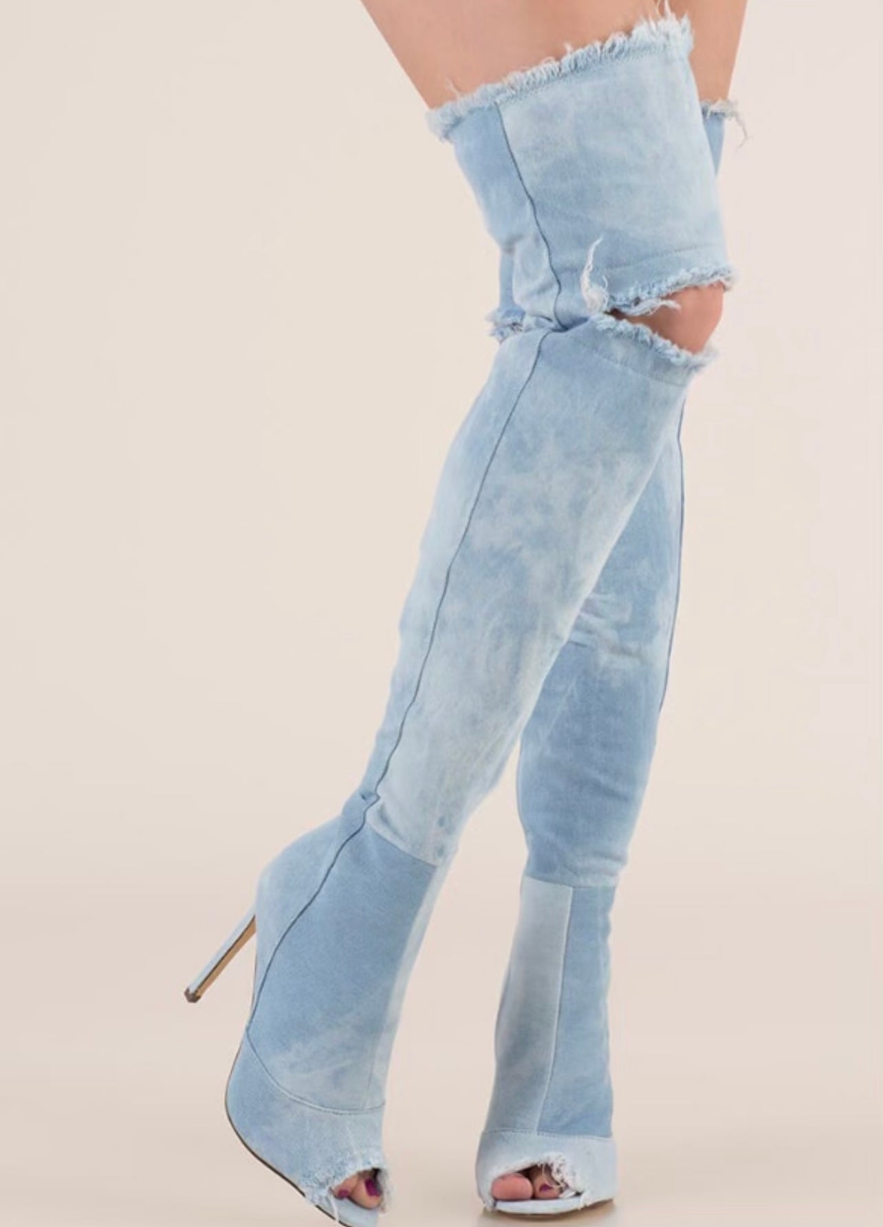 “She’s All That” thigh-high denim boot